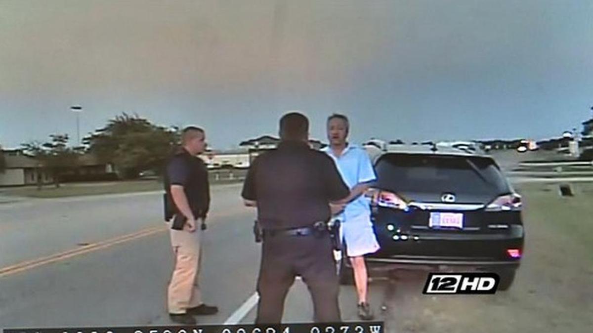 A man identified as Tom Bean City Councilman Ben Vincent is questioned on the side of the road in Whitewright, Texas, after being pulled over on suspicion of driving while intoxicated.