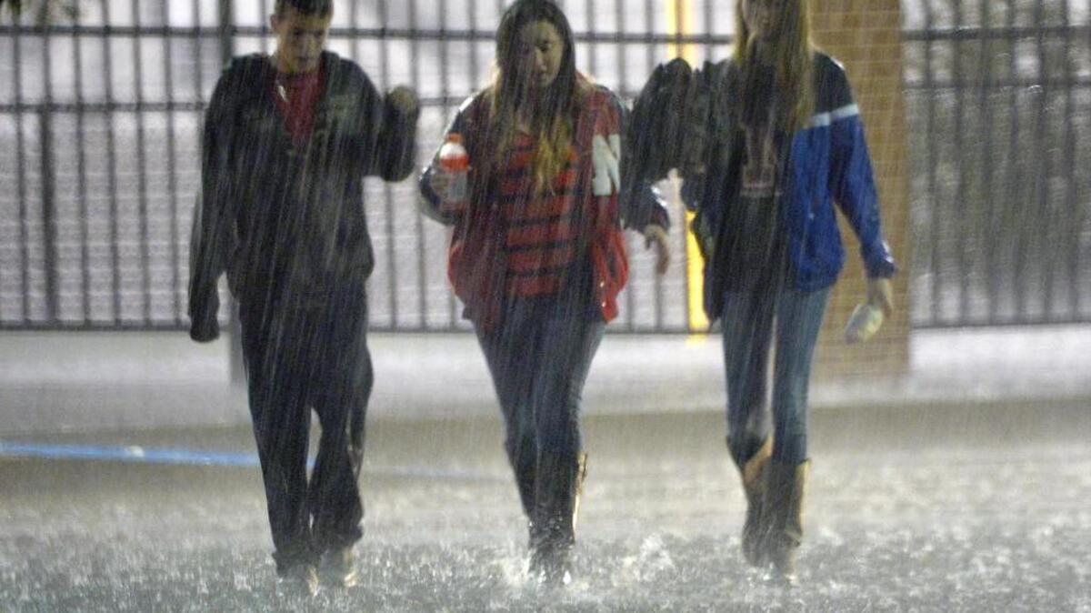 Fans leave the stadium after another lightning delay as Timber Creek plays Northwest at Northwest ISD Stadium in Justin on Friday.