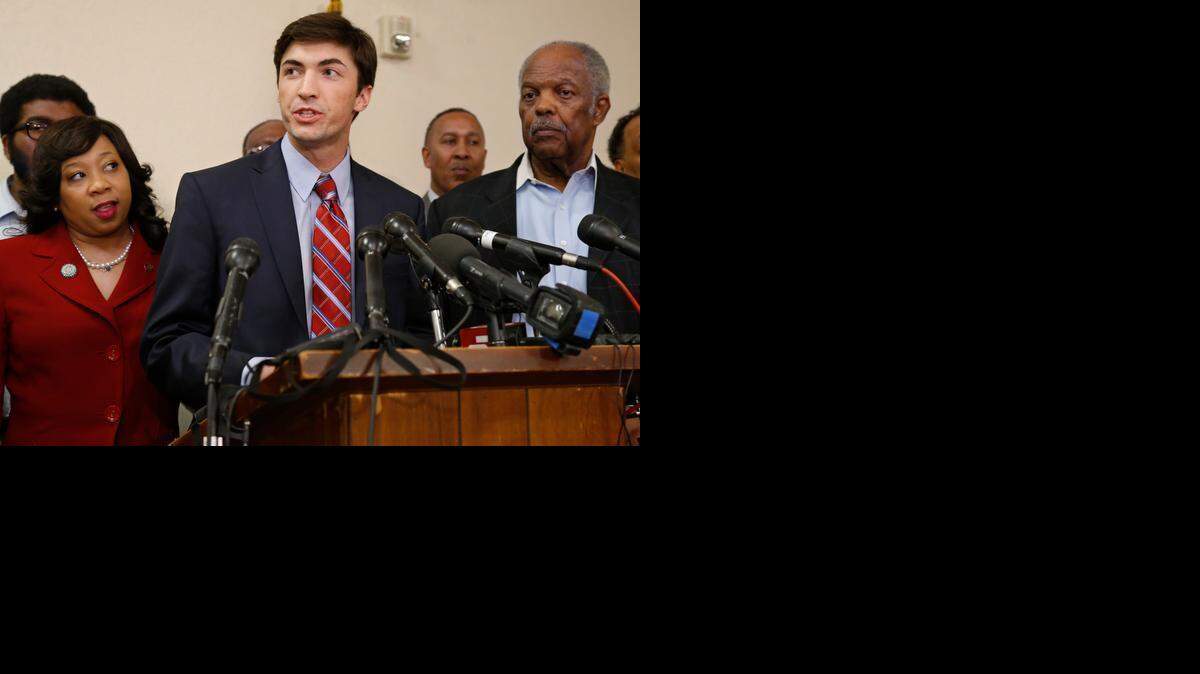 
Levi Pettit, center, a former University of Oklahoma fraternity member who led a racist chant, apologizes at a Wednesday news conference. 
