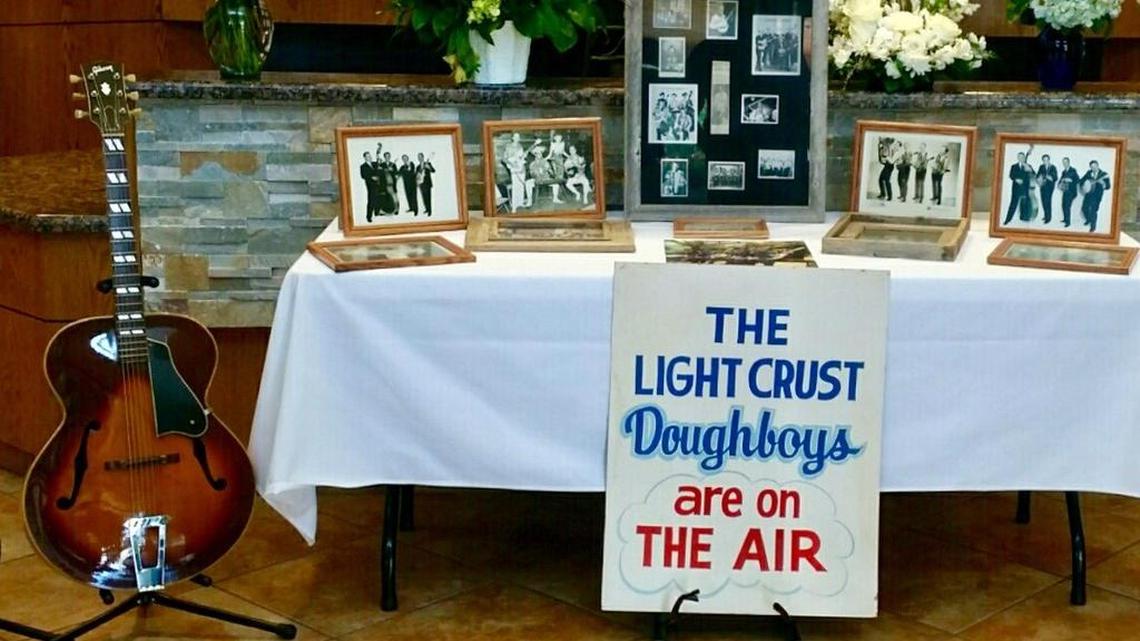 An old sign from Light Crust Doughboys appearances was part of the memorial to Bill Hudson, who died this month at 90.