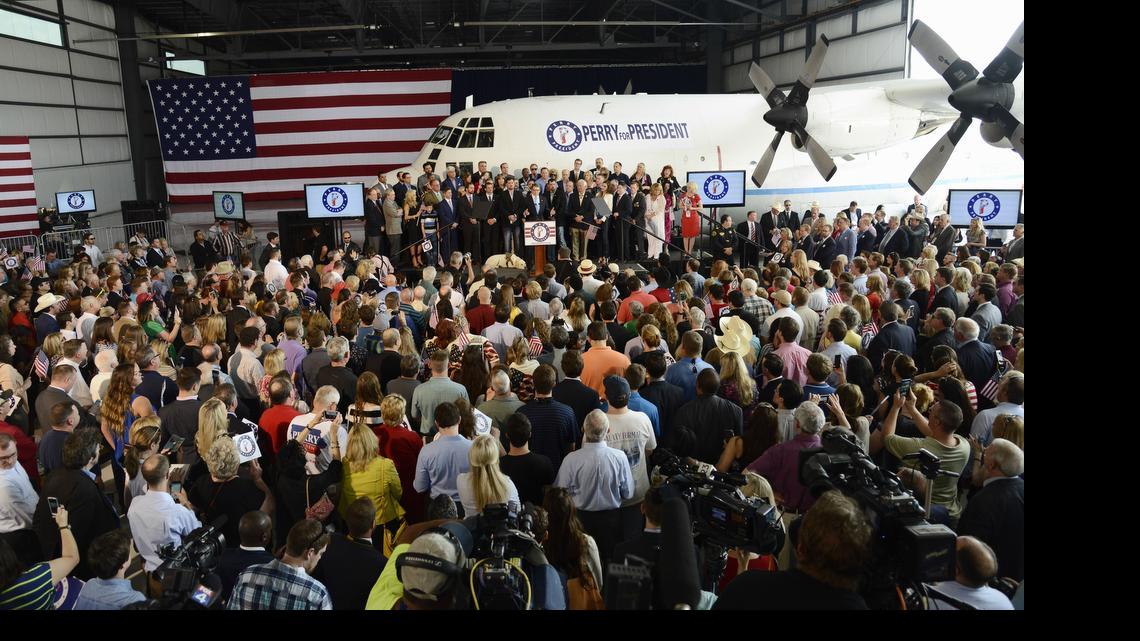 
A rented C-130A became the backdrop for Rick Perry’s speech at Addison Airport.
