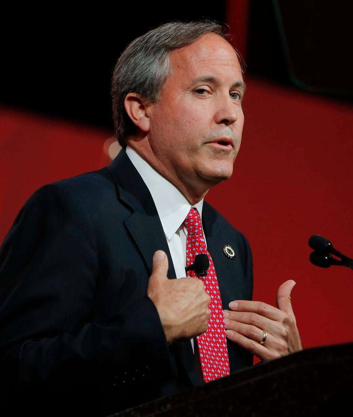 Attorney General Ken Paxton, under felony indictment in a securities case, spoke at a morning prayer breakfast and also at the convention.