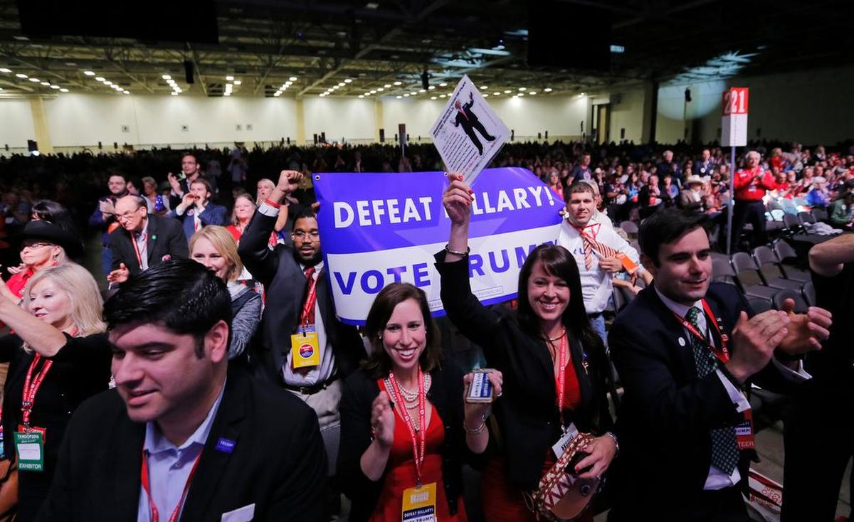 Supporters of Donald Trump sit at the front while U.S. Sen. Jeff Sessions urges delegates to unite behind Donald Trump at the Republican Party of Texas state convention at the Kay Bailey Hutchison Convention Center in Dallas.