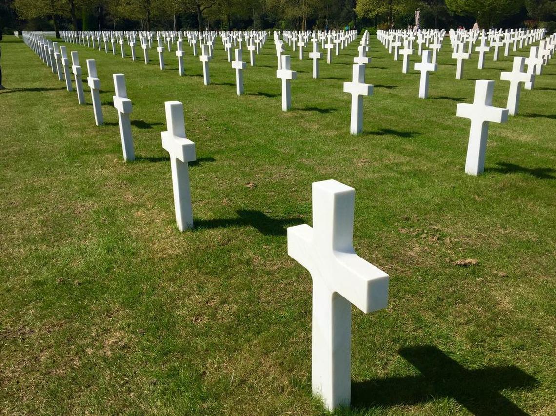 9,387 Americans are buried in the Normandy American Cemetery.