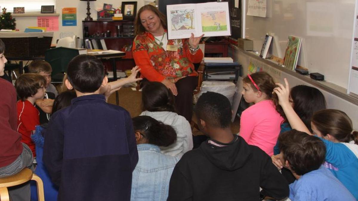 
Keller school trustee Ruthie Keyes, seen here reading to fourth-graders, faces a challenger who never campaigned.

