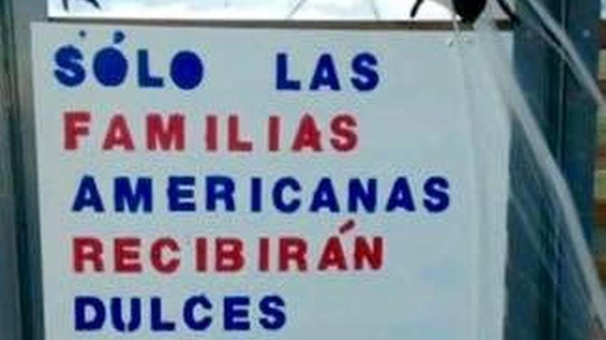 A sign in government housing for Border Patrol employees in Presidio reads “Only American families receive sweets.”