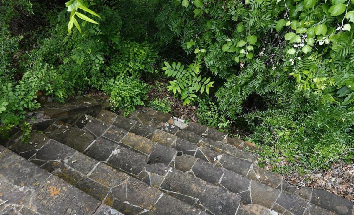 The hillside is eroding beneath steps at Top O’ Hill Terrace.