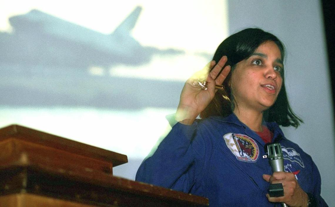 NASA astronaut Kalpana Chawla describes her experiences in space to students at Stevens Elementary School in Wallingford, Conn., May 4, 2000, as an image of a space shuttle is projected behind her. Chawla, 41, emigrated to the United States from India in the 1980s and became an astronaut in 1994. She was one of the seven astronauts killed aboard space shuttle Columbia, Saturday, Feb. 1, 2003.