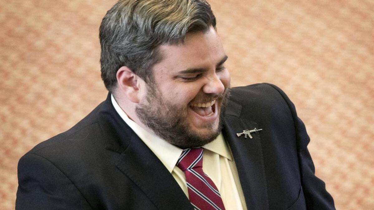 
State Rep. Jonathan Stickland, R-Bedford, wearing a gun lapel pin, during an April 17 House debate on open carry
