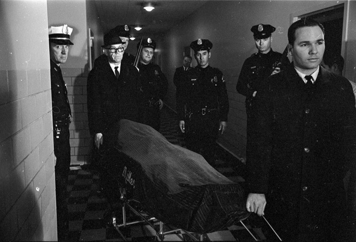 Miller Funeral Home removes body of Lee Harvey Oswald from Parkland Hospital and will transport it to Rose Hill Cemetery.