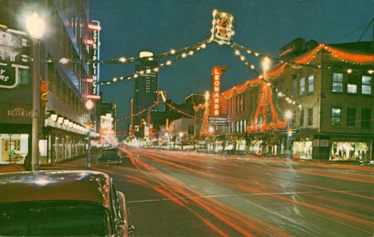 In the 1950s, Leonards Department Store and W.C. Stripling’s, seen at left in this commercial postcard, drew shopping crowds to the 200 block of Houston Street at Christmas. The crowds walked past frequent street vendor Frankie Brierton of Santo, who chose to crawl and sell pencils instead of using a wheelchair.