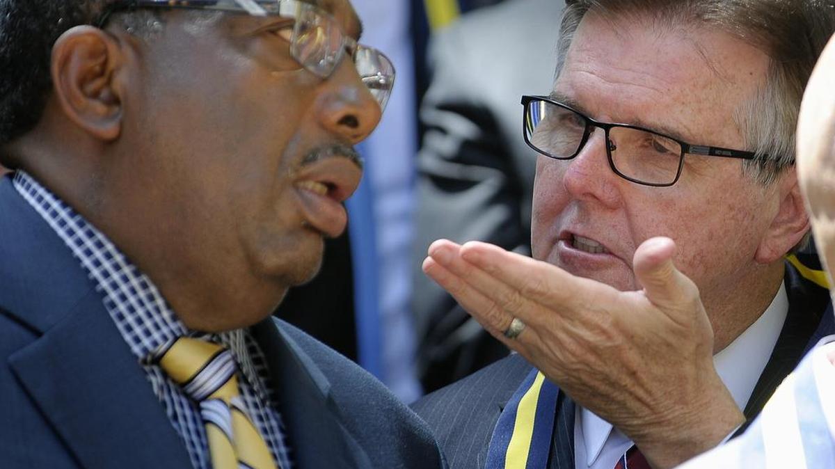 Lt. Gov. Dan Patrick, right, talks with state Sen. Royce West, D-Dallas, at a prayer service Friday in Dallas.