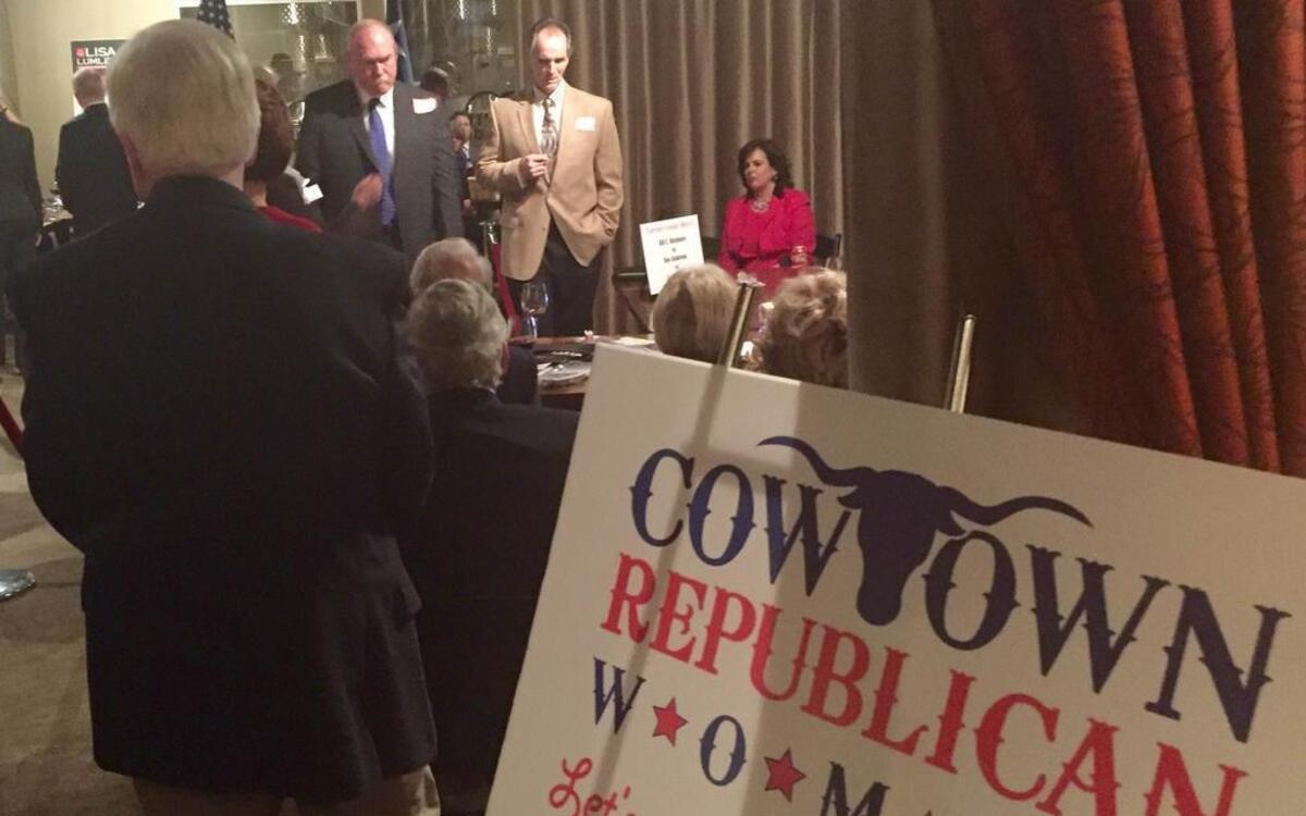 Candidates for sheriff Bill Waybourn and John Garris, background, spoke separately with several small groups at the Cowtown Republican Women forum Monday night at Times Ten Cellars.