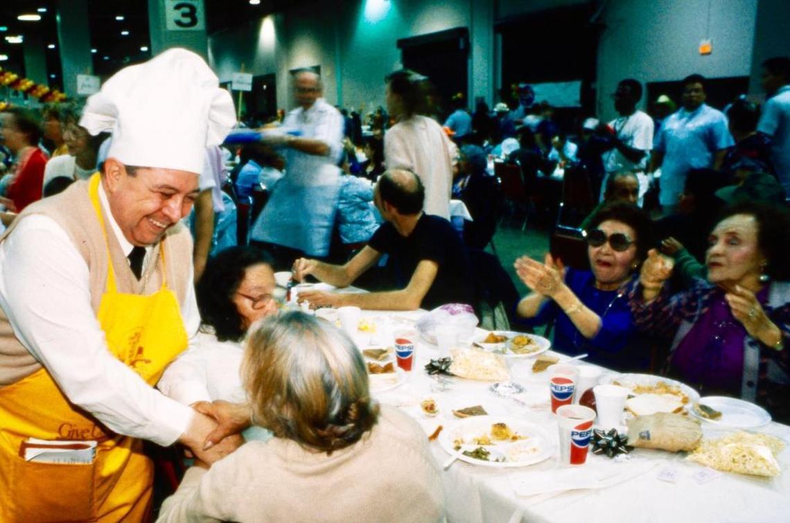 Raul Jimenez served thousands at Thanksgiving dinners in the Amon G. Carter Jr. Exhibits Hall.