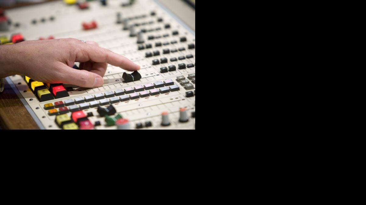 
A WBAP/820 talk host works the board in a 2009 photo.

