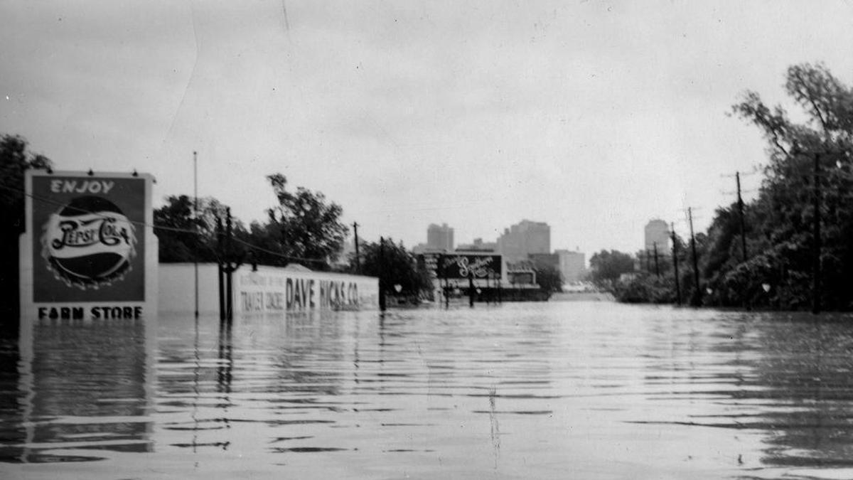 In 1949, floodwater was 12 feet deep in the 2200 block of West Seventh Street where a new supermarket stands today in the Left Bank shops.