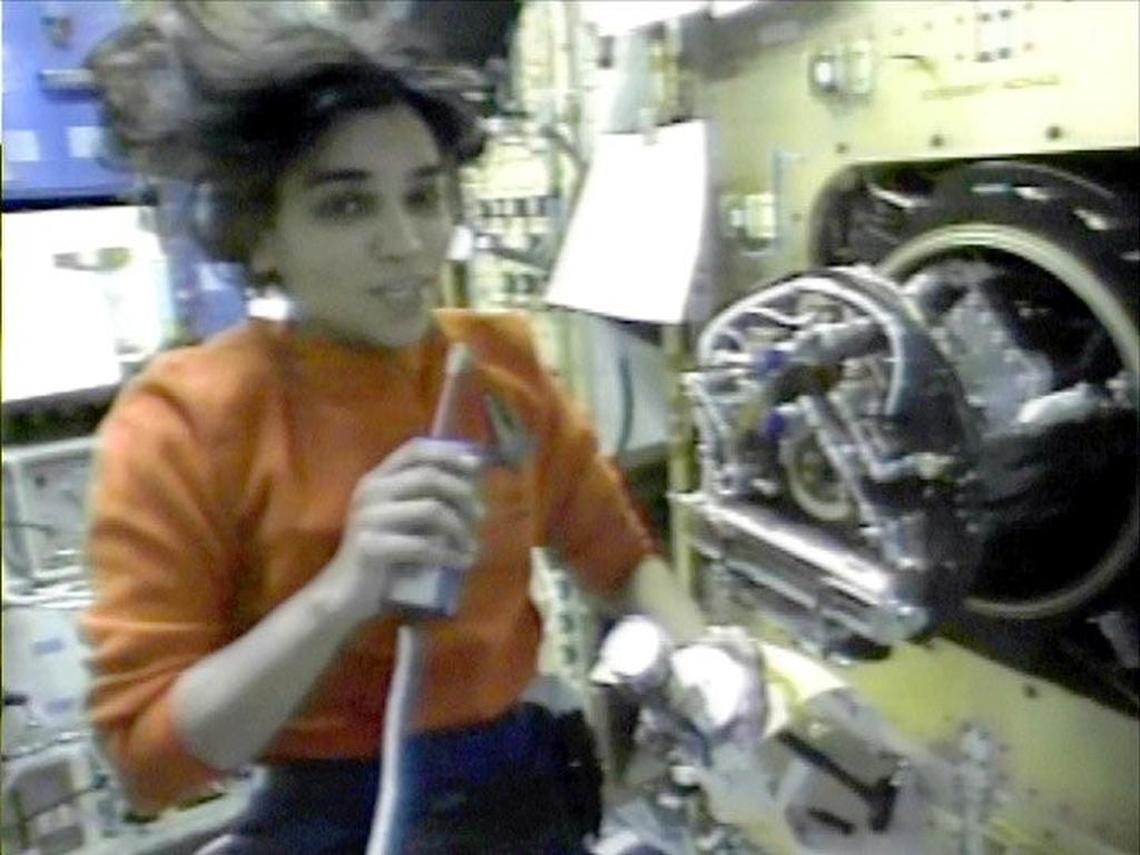 In this image from television, shuttle mission specialist Kalpana Chawla prepares to replace a part in the combustion module of the SPACEHAB research Module aboard the space shuttle Columbia, Tuesday, Jan. 28, 2003. NASA lost communication with space shuttle Columbia as the ship soared over Texas several minutes before landing Saturday morning Feb. 1, 2003.
