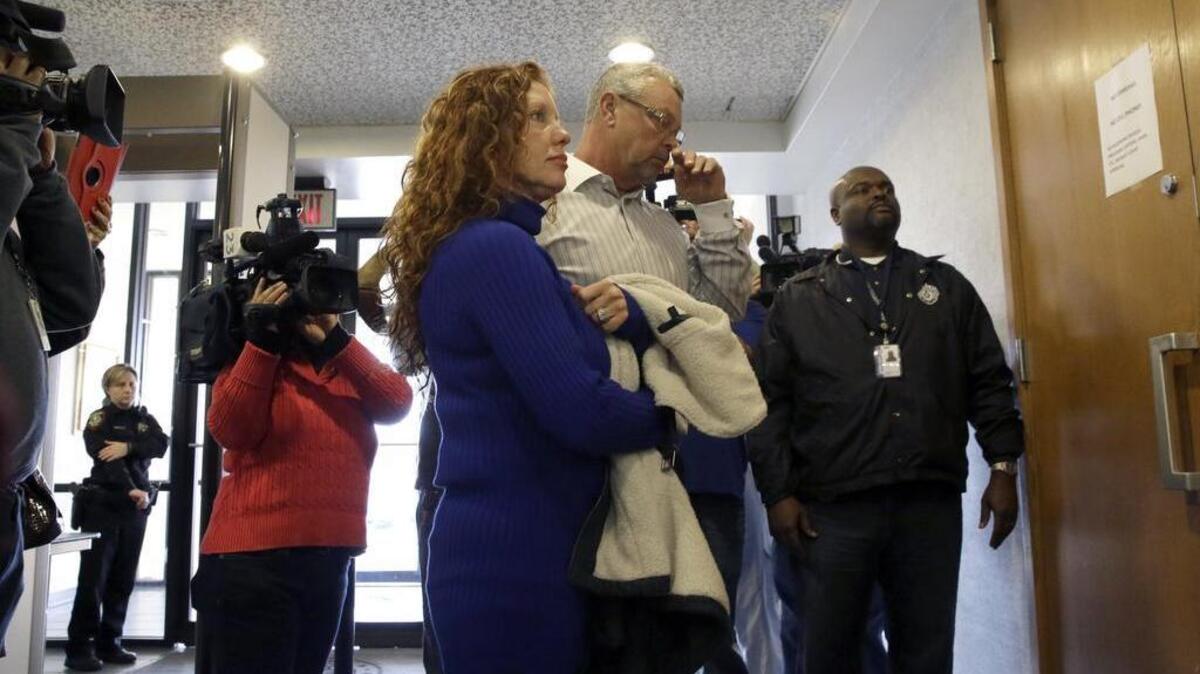 Tonya Couch, left, and Fred Couch, parents of teenager Ethan Couch, arrive at juvenile court for a hearing about their son’s future Feb. 5, 2014, in Fort Worth. Judge Jean Boyd again decided to give no jail time for Ethan Couch, who was sentenced to 10 years’ probation in a drunken-driving crash that killed four people, and ordered him to go to a rehabilitation facility paid for by his parents. The sentence stirred fierce debate, as has the testimony of a defense expert who says Couch’s wealthy parents coddled him into a sense of irresponsibility. The expert termed the condition “affluenza.”