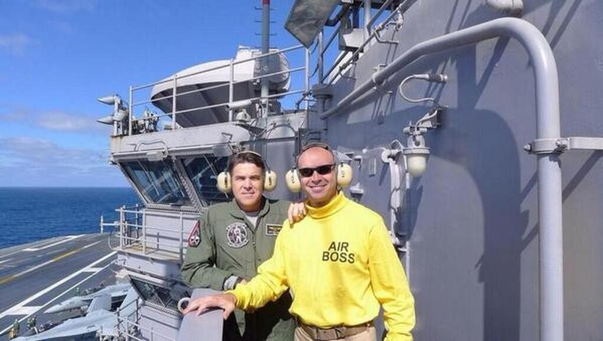 Jake Ellzey tweeted a 2014 photo aboard the USS Ronald Reagan with former Gov. Rick Perry.