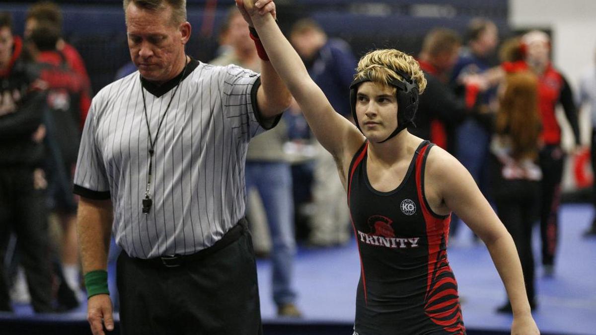 Trinity’s Mack Beggs won a regional semifinal, pinning Kailyn Clay of Grand Prairie.