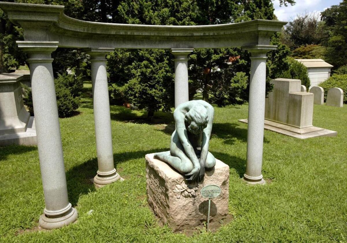 A sculpted figure of a bereaved female dancer at the grave of dancers Vernon and Irene Castle at the Woodlawn cemetery in the Bronx.