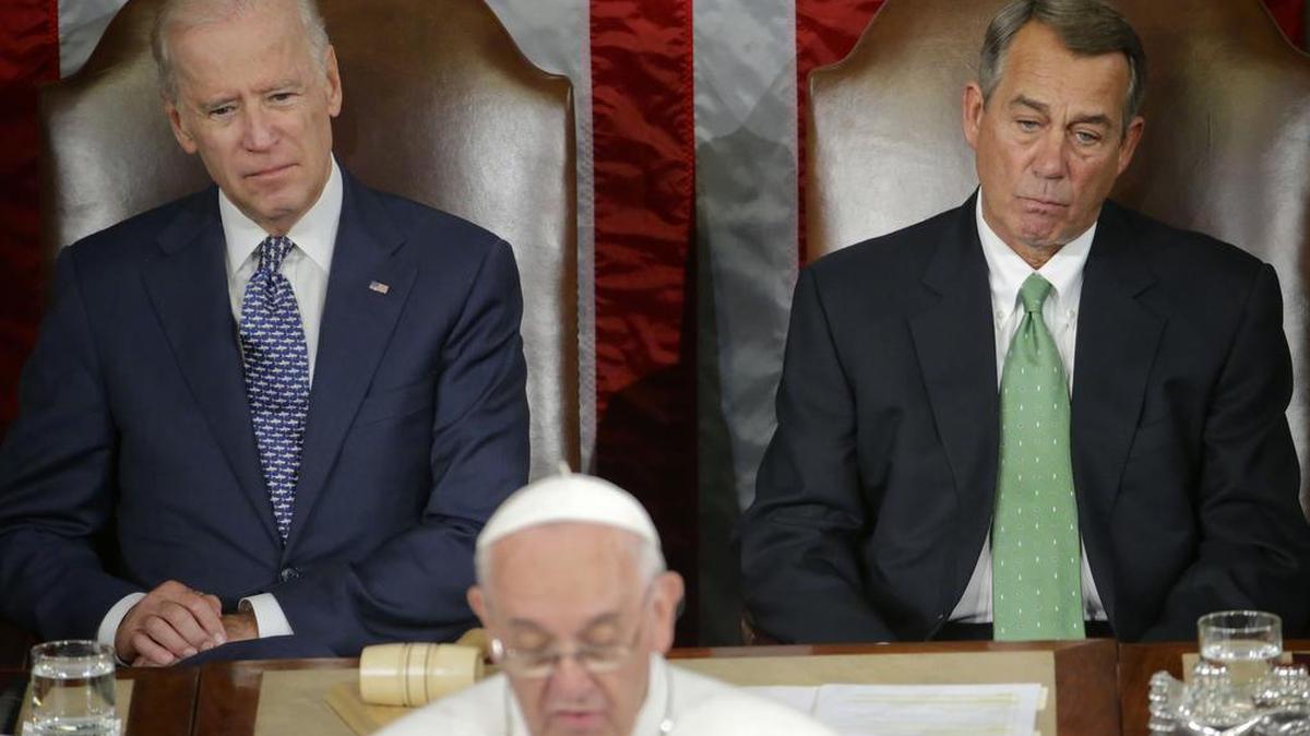 
Vice President Joe Biden, left, a Democrat, and House Speaker John Boehner, right, a Republican, listen to Pope Francis address Congress Sept. 24.
