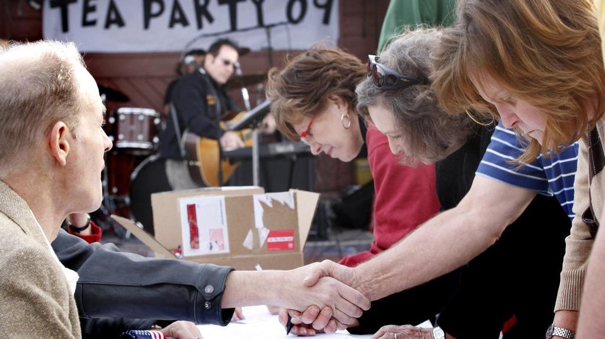 At the first local Tea Party in 2009, protesters signed petitions opposing recent government bailouts.