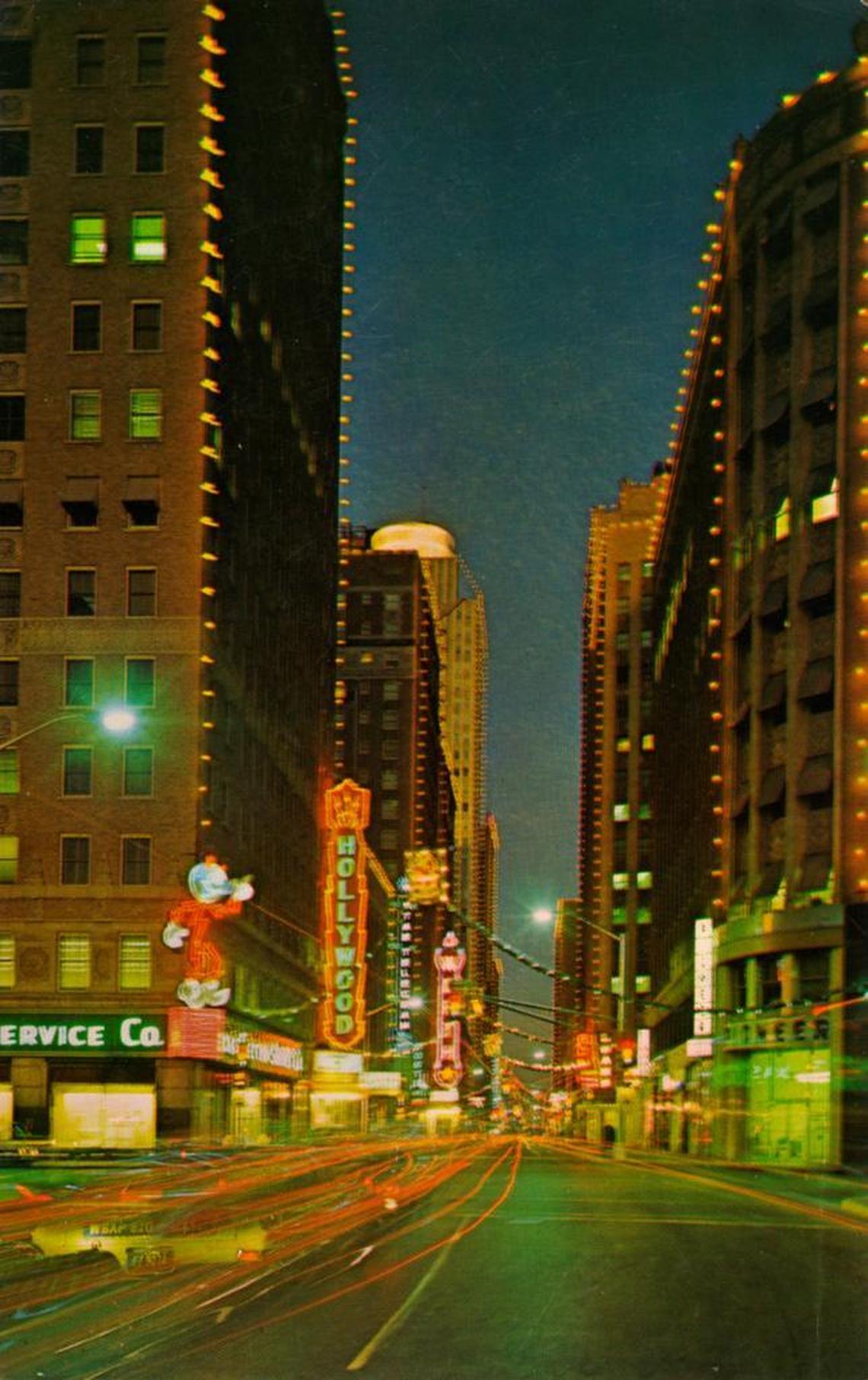 In the 1960s, West Seventh Street (looking east from Lamar Street) was “show row” with the Hollywood and Worth movie theaters at left along with the Texas Electric Service Co. building (and Reddy Kilowatt) and the Star-Telegram Building outlined for Christmas. The Neil P. Anderson Building is at right. The text of the postcard describes a “Famous Holiday Festival of Light.”