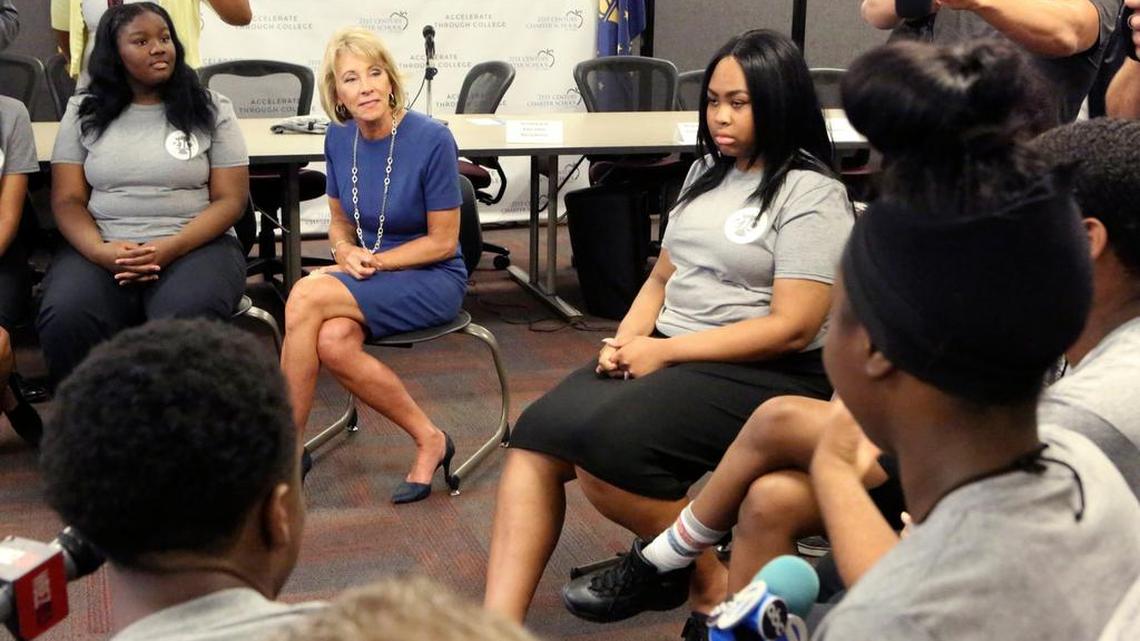 U.S. Secretary of Education Betsy DeVos has come under fire from immigration advocates for saying local school communities should decide whether to report undocumented students to federal authorities.