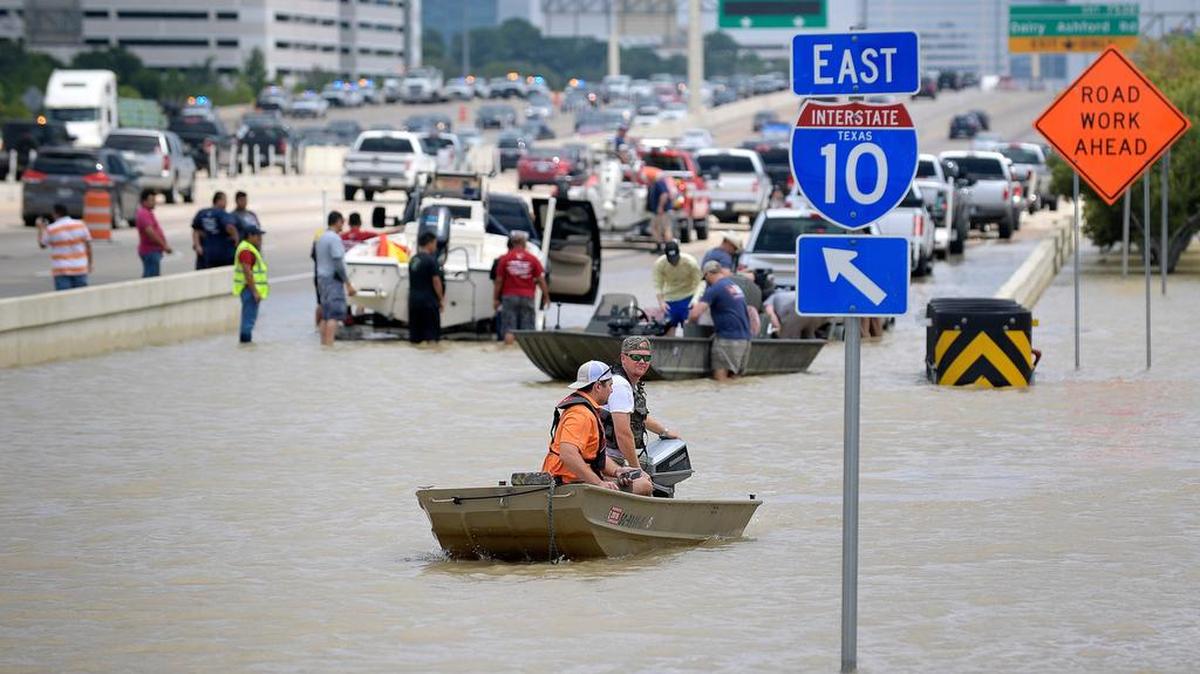 An entrance ramp to Interstate 10 became a boat ramp as volunteers brought their vessel to patrol the flood waters associated with tropical storm Harvey in Houston, TX, Wednesday, Aug. 30, 2017.