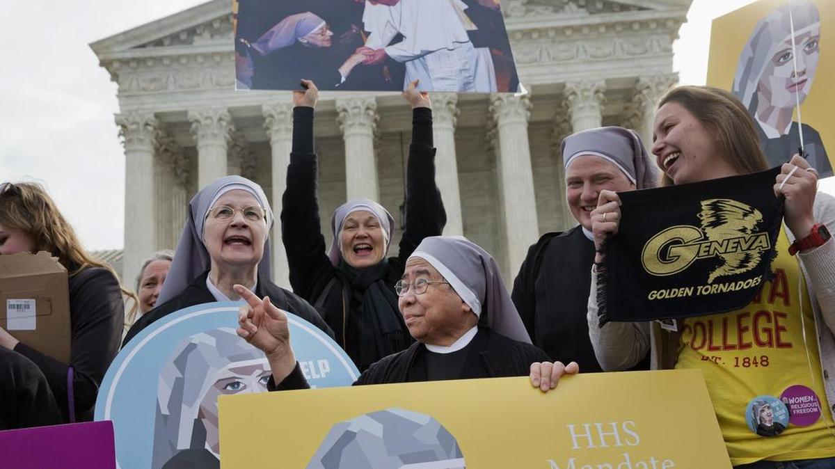 Nuns with the Little Sisters of the Poor rally March 23 outside the Supreme Court in Washington.