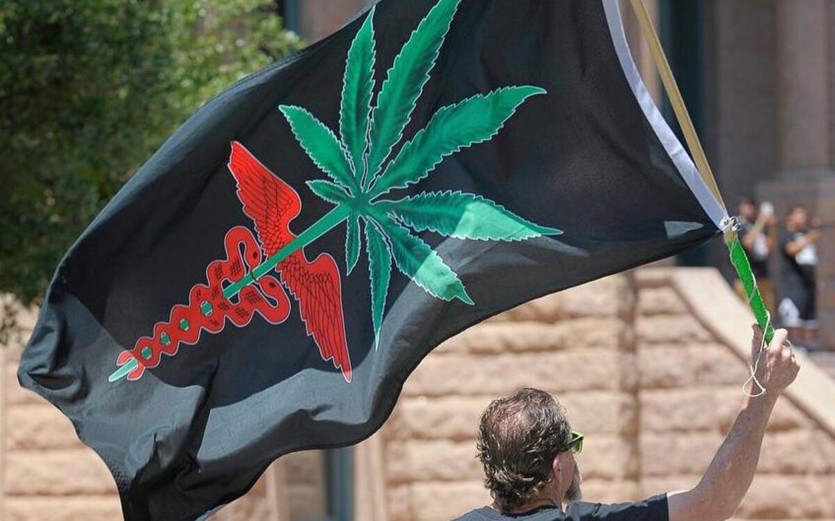 Large crowd participates in Saturday's DFW NORML Marijuana March in downtown Fort Worth, May 7, 2016.