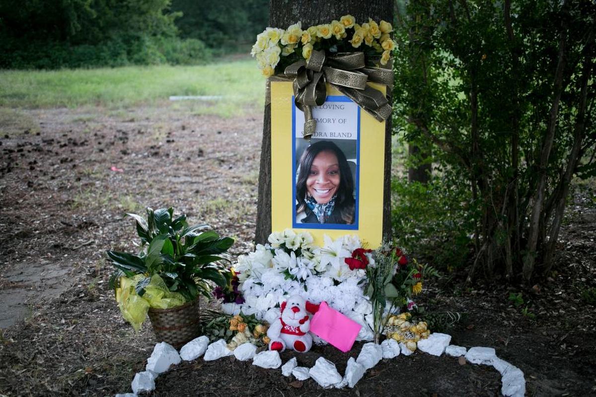 FILE -- A memorial for Sandra Bland near where she was arrested in Prairie View, Texas, July 23, 2015. A panel reviewing the Texas jail where Bland, a 28-year-old black woman, was found dead three days after being arrested last July has called for major changes in the treatment and medical screening of inmates.