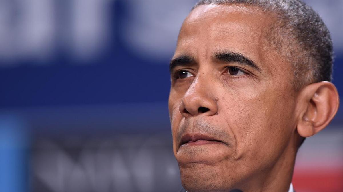 President Barack Obama speaks about the Dallas police shootings Friday during a news conference in Warsaw, Poland.