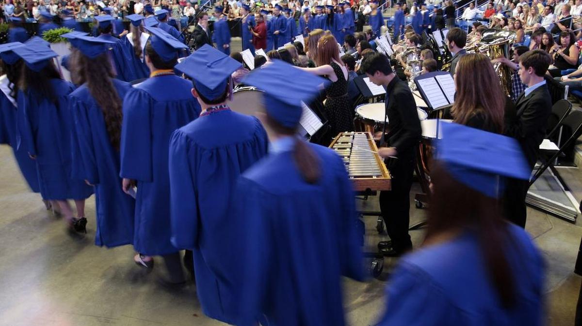 The high school graduation rate is up, but national test scores released Wednesday show troubling results in math and reading.