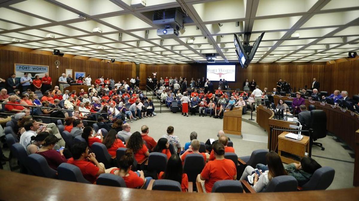 A standing room only crowd, with more in an overflow room viewing a remote video feed, attend a Fort Worth City Council meeting at City Hall, Tuesday, Aug. 15, 2017.