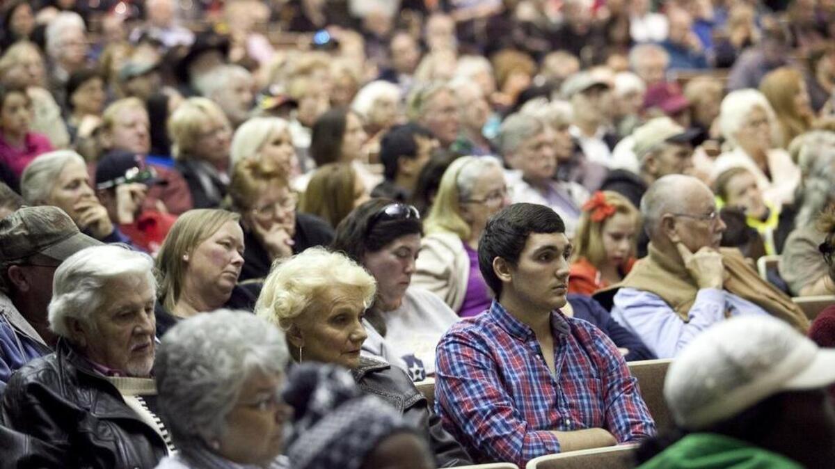 Several hundred people showed up to a town meeting discussing the recent earthquake activity with Railroad Commissioner David Porter and other Texas Railroad Commission officials at Azle High School on January 2, 2014.