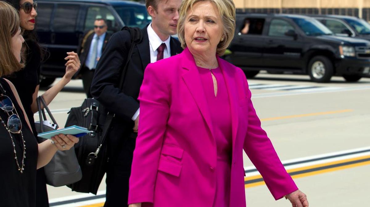 Presumptive Democratic presidential candidate Hillary Clinton arrives Tuesday at Andrews Air Force Base, Md., to travel with President Obama for campaigning in Charlotte, N.C.