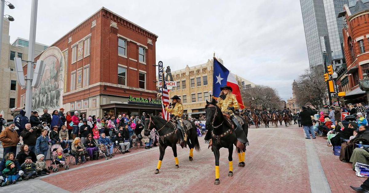 The 2016 Stock Show parade passes Jamba in Sundance Square plaza.