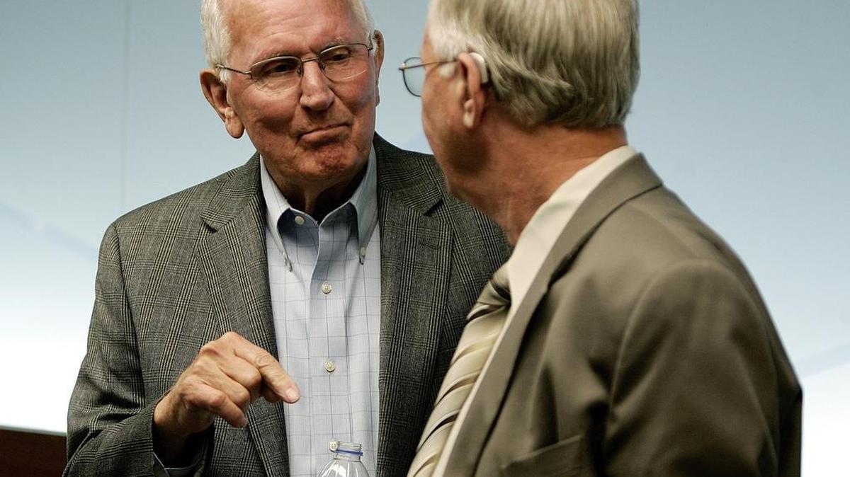 Hurst mayor Richard Ward and councilman Larry Kitchens share a moment during the opening of a new police storefront in Hurst Thursday afternoon March 26, 2015. Both Hurst and Bedford police departments will use the facility.