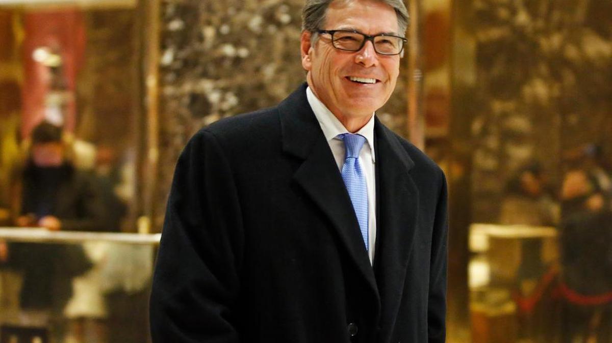 Former Texas Gov. Rick Perry smiles Monday as he leaves Trump Tower in New York. President-elect Donald Trump selected Perry to be energy secretary.