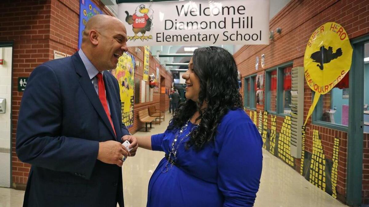 
Fort Worth’s superintendent finalist Kent Paredes Scribner was on site Aug. 24 for the first day of school at Diamond Hill Elementary and met school principal Marlyn Martinez in the hallway. 
