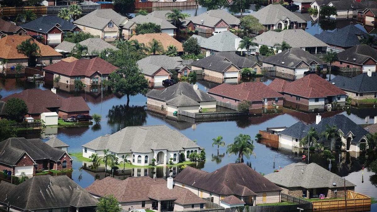 Flooding in a neighborhood in the Houston area, Sept. 1, 2017. A week after the storm Harvey began battering southeast Texas, residents in some places returned home and began the long, hard slog toward recovery, while other areas remained very much in the midst of a crisis on Friday.