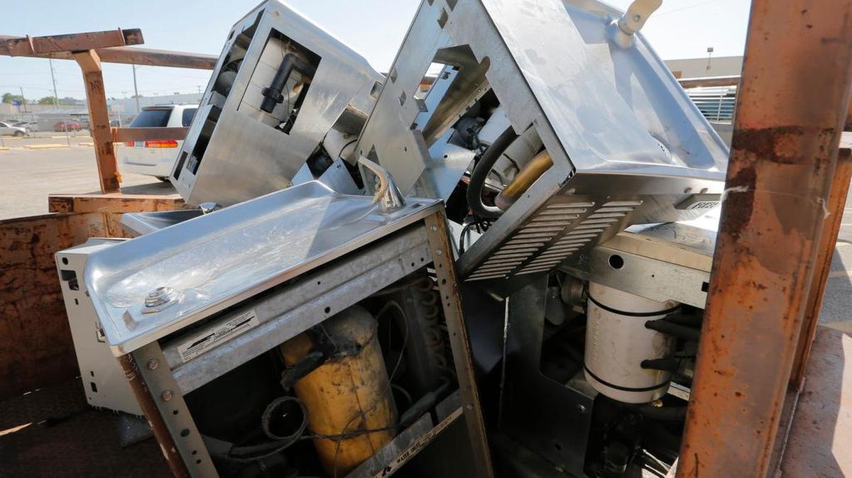 A trailer is loaded with water fountains from several Fort Worth Independent School than have been removed for safety reasons, Monday, August 1, 2016. The design of the fountains allows water to sit in a tank and metals, including lead, collect in the water and higher than allowable levels.