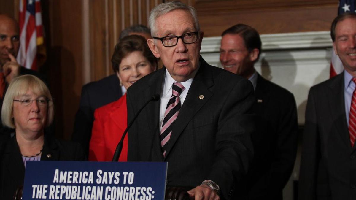 Senate Minority Leader Harry Reid of Nev. speaks to reporters on Capitol Hill in Washington, Thursday, July 14, 2016, to discuss unfinished business before Congress prior to its recess. Congress is about to leave for a seven-week vacation without giving the Obama administration any of the $1.9 billion it's seeking to battle the Zika virus, and a Senate effort to revive the nuts-and-bolts process of passing agency budgets faces another setback at the hands of Democrats.