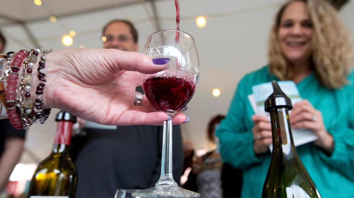 28th Annual GrapeFest - A Wine Experience featured unique wines, fantastic finds, live entertainment and family-friendly fun in Historic Downtown Grapevine on Friday, September 11, 2014.