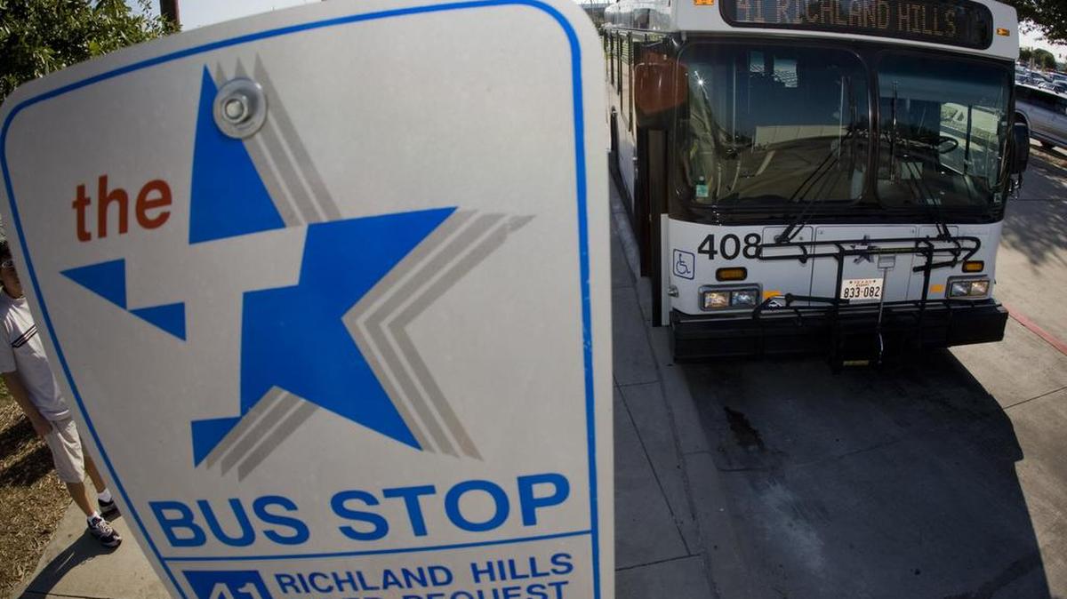 A Fort Worth Transportation Authority bus waits to pick up passengers in Richland Hills.