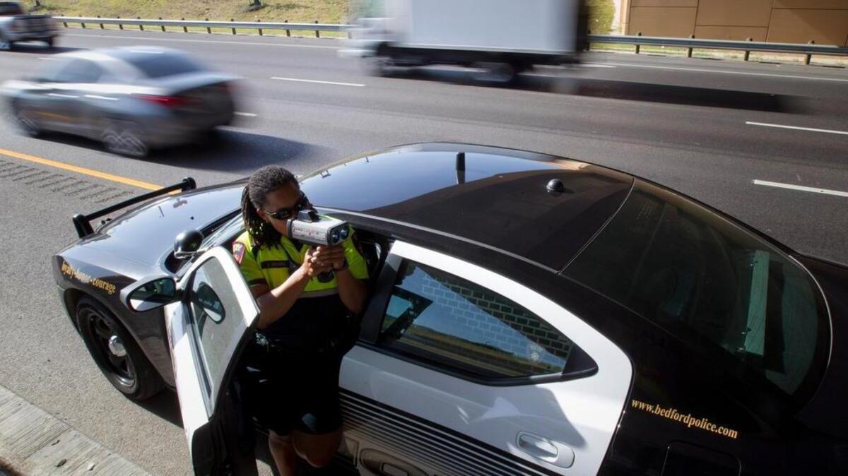 Bedford Police Officer D. Spears clocks speeders on Texas 121/183 in 2015.