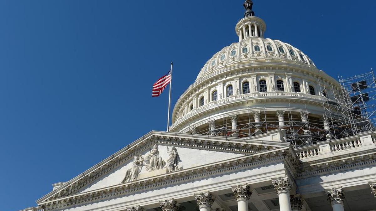 An American flag flies over Capitol Hill last month in Washington, D.C.