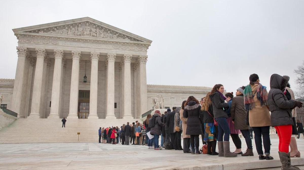 People stand in line Dec. 9 hoping to enter the Supreme Court for arguments in the Fisher v. University of Texas at Austin affirmative action case.